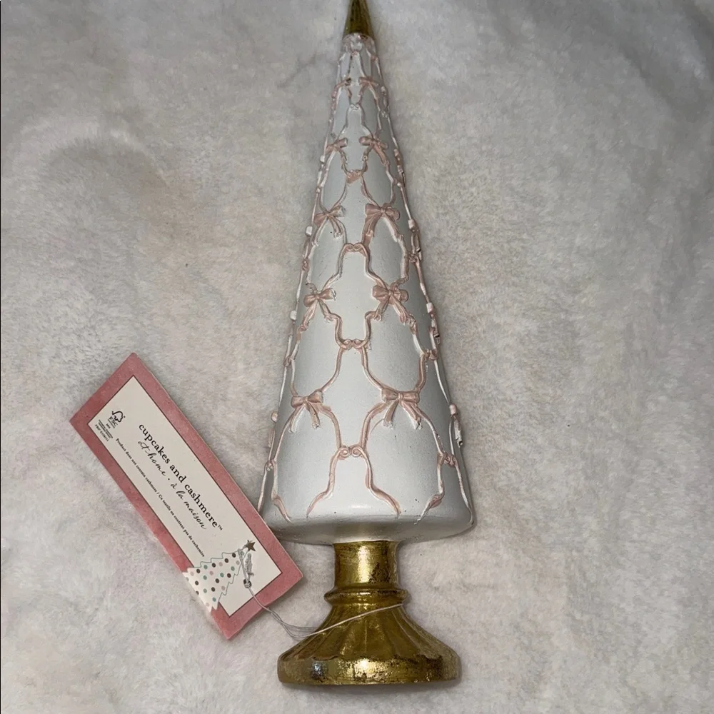 Cupcakes and cashmere Christmas Tree pink bows across white cone & gold base